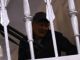 Алмазбек Атамбаев и его боевики во вреям штурма дома экс-президента. Фото: AP